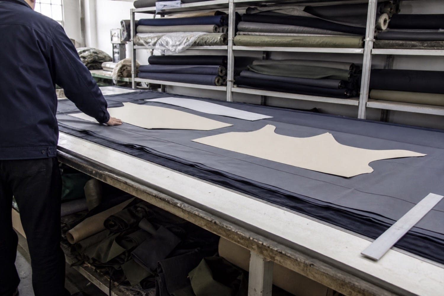 Fabric laid out for cutting in the cutting department
